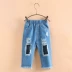 Cô gái quần 2018 mùa hè mới Hàn Quốc phiên bản của lỗ thêu quần trẻ em nhỏ bé quần jean giản dị thủy triều yếm bò cho bé Quần jean