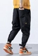 Mùa thu và mùa đông quần nam nhiều túi yếm Velcro chân quần thủy triều thương hiệu nghệ thuật thanh niên nam giới giản dị quần Harlan quần nam phong cách Hàn Quốc Quần Harem