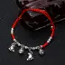 Gốc phong cách dân tộc đồ trang sức nhỏ trang sức năm nay nữ sợi dây màu đỏ dệt tay DIY red hạt vòng chân