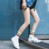 Mùa xuân và mùa hè ống vớ nữ vớ cotton nữ cầu vồng sọc vớ nữ vớ skateboard Hàn Quốc vớ cá tính vớ thủy triều