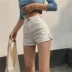 Hồng Kông hương vị retro cao eo mỏng giảm béo đàn hồi quần nóng hoang dã Một từ phía dây kéo khe quần short nữ jeans Quần jean