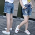 Cô gái lớn 2018 mùa hè mới rửa vụn quần short denim hot quần trẻ em Hàn Quốc phiên bản mặc quần short triều phụ nữ