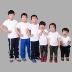 Tinh khiết bông trắng trẻ em của vòng cổ ngắn tay T-Shirt chàng trai và cô gái mặc tay sơn trống từ bi mẫu giáo quần áo