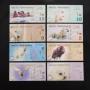 8 bộ của Bắc Cực Nhân Dân Tệ động vật kỷ niệm ngân hàng Bắc Cực lục địa tiền xu kỷ niệm nhựa tiền giấy ngoại tệ bộ sưu tập tiền xu đồng xu bạc cổ