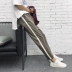 Phiên bản Hàn Quốc của xu hướng quần nam thanh lịch Quần âu nam chân mỏng thể thao màu trắng bên hè quần đen quần thể thao Crop Jeans