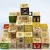 Trẻ em của khối xây dựng giáo dục sớm giáo dục đồ chơi thông ABC chữ cái Tiếng Anh khối lượng khối hộp gỗ 48 viên in khối Khối xây dựng