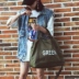 Túi du lịch đường dài túi xách nữ Hàn Quốc phiên bản của vai túi du lịch nội trú bag đơn giản túi duffel túi thể dục thủy triều