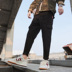 Quần nam phiên bản Hàn Quốc của xu hướng hip hop chân chín quần thủy triều thương hiệu quần giản dị quần harem quần yếm quần legging nam Crop Jeans