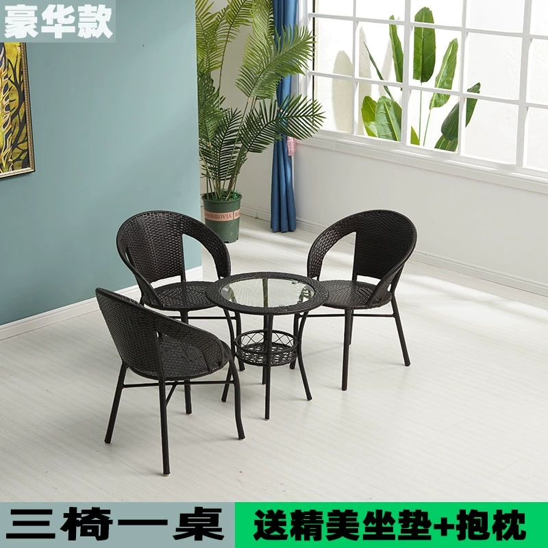 Ghế mây Ningqi bộ ba món bàn cà phê nhỏ ban công bàn ghế nhỏ sân ngoài trời hiện đại đơn giản kết hợp đơn Teng dệt ghế 