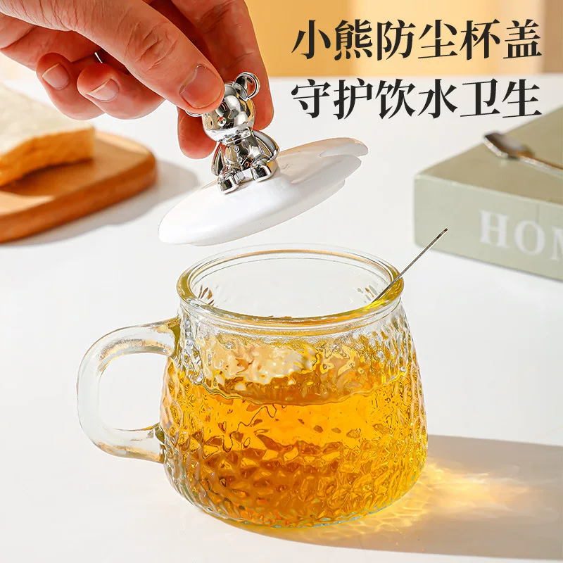 Glass tea cup, flavored tea, with little bears