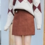 Váy len nữ mùa thu đông 2017 phiên bản Hàn Quốc mới của retro caramel màu eo cao váy sinh viên túi hông một chiếc váy chữ chân váy kaki dài