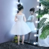 Trẻ em ăn mặc công chúa váy trắng hoa cô gái từ vai đàn piano trình diễn sàn catwalk buổi tối ăn mặc cô gái đám cưới phần dài mùa thu thời trang cho bé Váy trẻ em