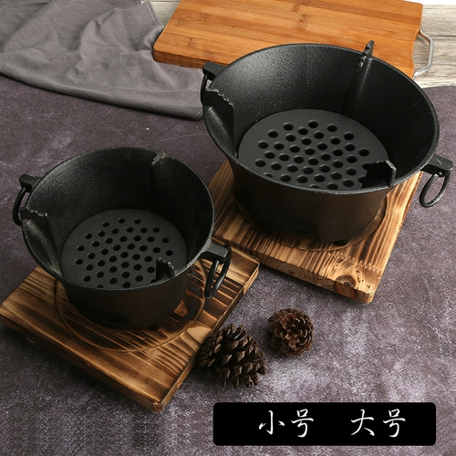 Чугунная угольная печь Японская печь с варенованной печью из сухой котелной плиты на гриле на гриле.