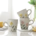 Xuất khẩu Hàn Quốc Gạch bông tuyết men Vẽ tay Cup Cup Cup Bữa sáng chạm nổi cốc sữa vài cặp hoa hướng dương Phong cách Nhật Bản - Tách