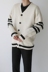 Vài áo khoác mùa thu và mùa đông mới hoang dã Hàn Quốc cotton dài tay đan sọc v-cổ áo len cardigan dòng thủy triều Cặp đôi áo len