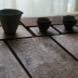 Mưa Nhật pallet gỗ đế lót ly quả óc chó màu đen gỗ trà gợn sóng bằng tay khắc khay khay Tây Khay gỗ
