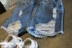 Quần jean trẻ em 2018 mùa hè mới cô gái Hàn Quốc thời trang lỗ quần short denim hoang dã denim nóng quần quần jean ống rộng cho bé gái Quần jean