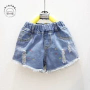 Quần áo trẻ em 2018 mùa hè cô gái mới rửa tóc cạnh quần short denim phun lỗ casual hoang dã quần nóng