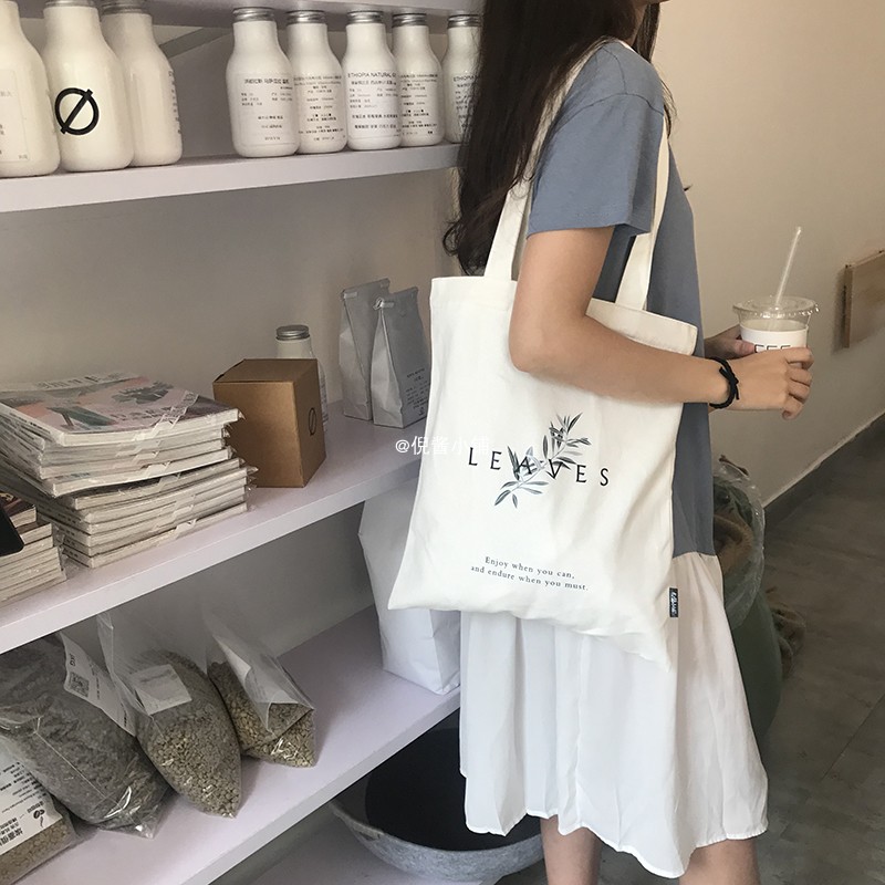 ins风单肩帆布包女大容量百搭布袋包-秒客网