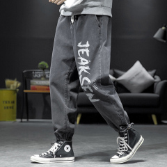 字母印花牛仔褲男秋冬款潮流胖子加肥加大碼寬鬆男士抽繩束腳褲子