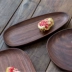 Đen walnut khay không thường xuyên đá sỏi món ăn hình bầu dục tấm gỗ đĩa trái cây chiếc đĩa trà khay khay snack khay trà