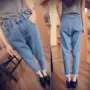 Phiên bản Hàn Quốc mới ra mắt quần lửng mỏng chân harem hoang dã đơn giản cao eo cao co giãn quần jeans nữ sinh viên thủy triều áo form rộng nữ cá tính