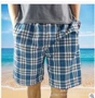 Mùa hè cha quần short nam trung và già kẻ sọc nửa quần lỏng cotton giản dị cộng với phân XL mặc quần quần jean nam ống rộng