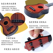 Trẻ em mới bắt đầu chơi guitar mô phỏng có thể chơi ukulele guitar nhỏ nhạc cụ đồ chơi âm nhạc 3-6-12 tuổi