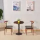 Один стол, два стула цвета грецкого ореха с круглым столом