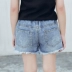 2018 mùa hè lỗ quần short denim trẻ em mới của trẻ em lớn hoang dã rửa sạch tóc bị hỏng cô gái nóng quần thủy triều quần jean trẻ em quảng châu Quần jean