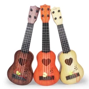 Nhỏ nó có thể chơi mô phỏng đàn ukulele vừa mới bắt đầu chơi nhạc cụ để gửi đồ chơi guitar cho trẻ em
