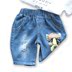 Quần short bé trai mùa hè mỏng trẻ em trẻ em 2018 lỗ mới hoạt hình mặc quần short denim hoang dã quần jean lửng trẻ em Quần jean