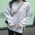 Cao đẳng phong cách retro cá tính lỗ lỏng áo len của phụ nữ Hàn Quốc phiên bản của mùa xuân sinh viên hoang dã áo t-shirt áo sơ mi nữ Áo len