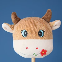 Коричневая корова