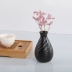 Gốm đen retro nhỏ bình phong cách Nhật hoa khô hoa Zen Zen hoa trang trí bàn bàn trang trí mềm mại - Vase / Bồn hoa & Kệ chậu đất nung trồng lan Vase / Bồn hoa & Kệ