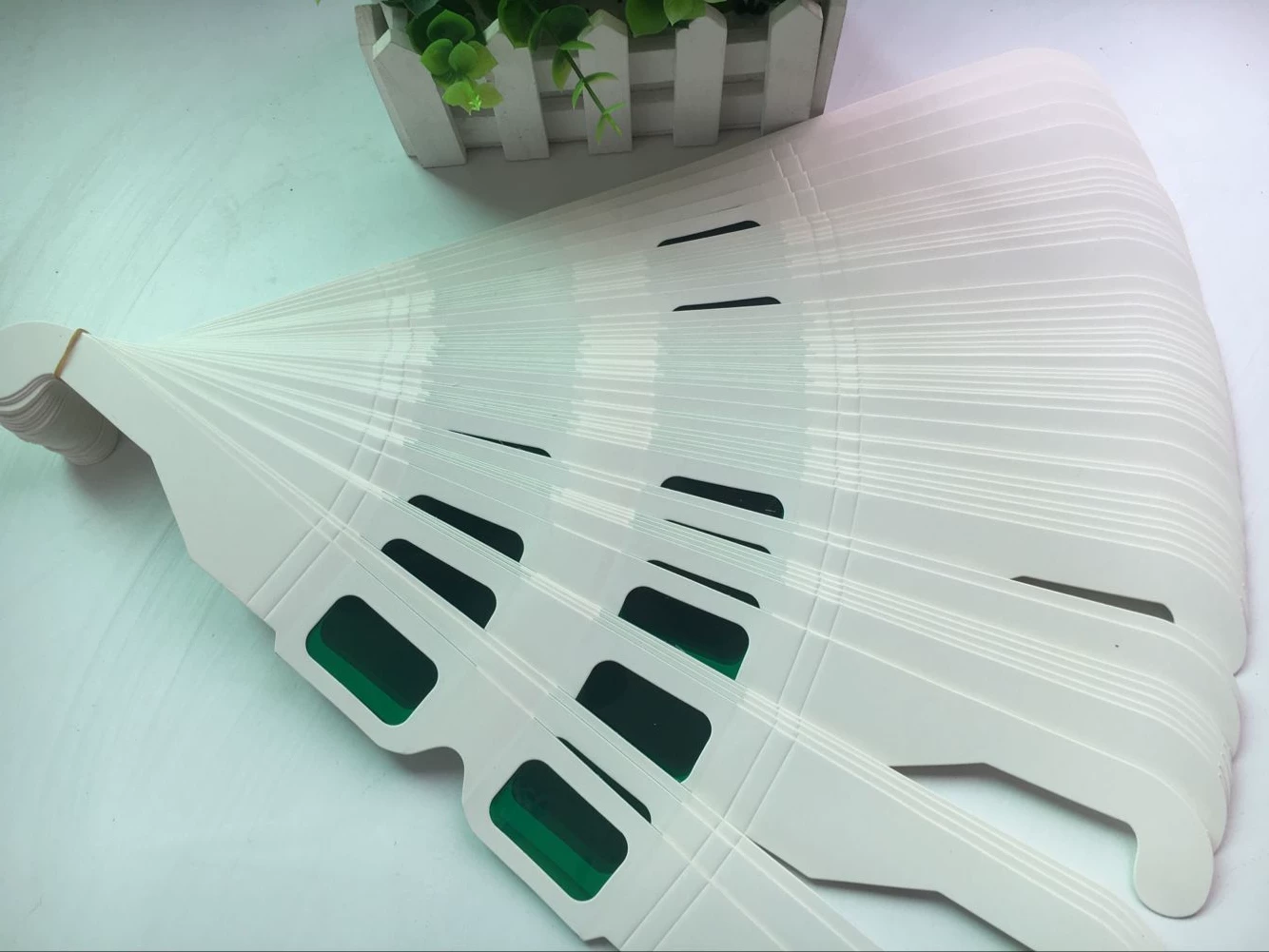 Lens, disposable green glasses