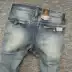 Ou Gutu mới mùa thu retro đơn giản giản dị chân Mỏng đàn hồi thấp eo jeans của nam giới kích thước lớn xiên pocket quan ao nam Cao bồi