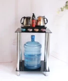 Простая современная маленькая квартира гостиная маленькая кофейня из нержавеющей стали творческий кофейный столик напряженный стеклянный край несколько уголков маленьких квадратных столов