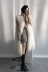 Thanh lịch và thanh lịch khí bãi biển len của phụ nữ triều dài màu be vest Hàn Quốc mới dày fur fur vest