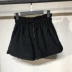 Phiên bản Hàn Quốc mát mẻ của quần short nhung dệt kim cao cấp mùa thu đông của phụ nữ mặc quần ống rộng ống rộng đế hoang đồ công sở nữ Quần short