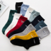 Tuần socks 7th socks nam giới và phụ nữ pha trộn với phổ letters thêu cotton khử mùi các cặp vợ chồng Nhật Bản trong vớ Vớ hàng tuần