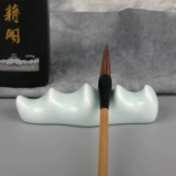 Джингджэнь волновая волна керамической кисти в форме ручки держателя ручки.