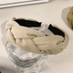 Бежевый ободок с косичкой