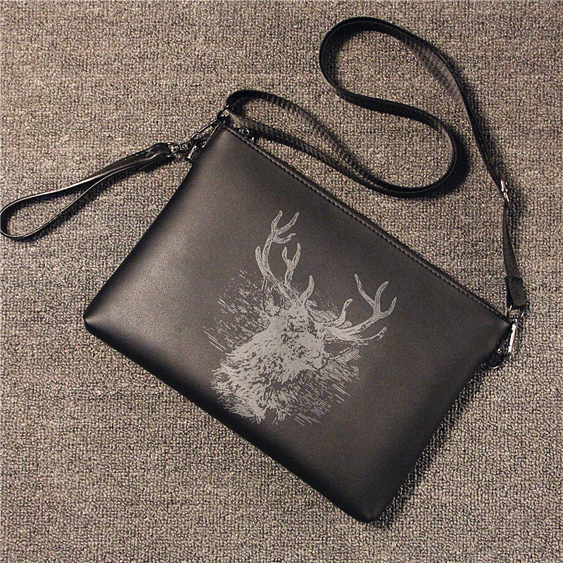 了得网女装_新款 手包男韩版潮 时尚鹿头手拿包软