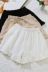 Mùa hè của phụ nữ Hàn Quốc phiên bản của lỏng thường đàn hồi eo tie nhỏ tươi lá sen quần short búp bê sinh viên quần nóng triều