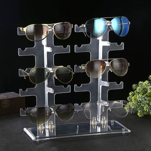 Стенд, солнцезащитные очки, трубка