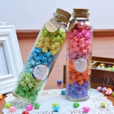 Цилиндрическая прозрачная стеклянная бутылка