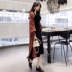 Thời trang thu đông 2018 phiên bản Hàn Quốc của áo len tay dài buông xõa hoang dã + Váy xòe nữ hai dây Cardigan