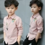 Quần áo trẻ em cậu bé áo sơ mi dài tay cotton phần mỏng 2018 mới của Hàn Quốc phiên bản của mùa xuân và mùa thu triều trẻ em mùa hè trắng ngắn tay áo sơ mi áo sơ mi bé gái mùa đông
