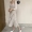 Đầu mùa thu Hàn Quốc phiên bản của chic kem chống nắng knit cardigan áo khoác mỏng hai mảnh hoa eo bandage strap dress nữ 	váy siết eo